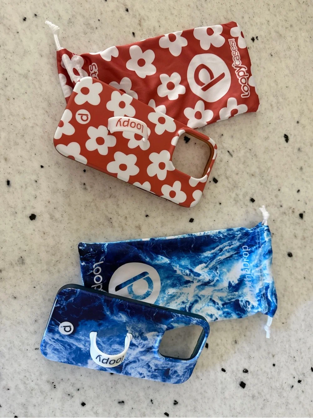 Loopy Case Duo — Red Floral & Blue Marble Phone Grip Cases